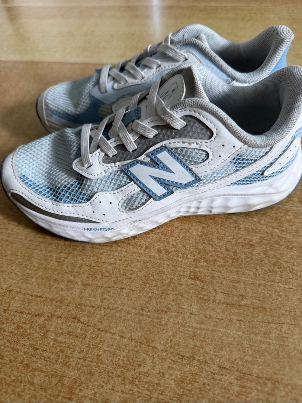 New Balance Kids White and Light Blue Athletic Sneakers